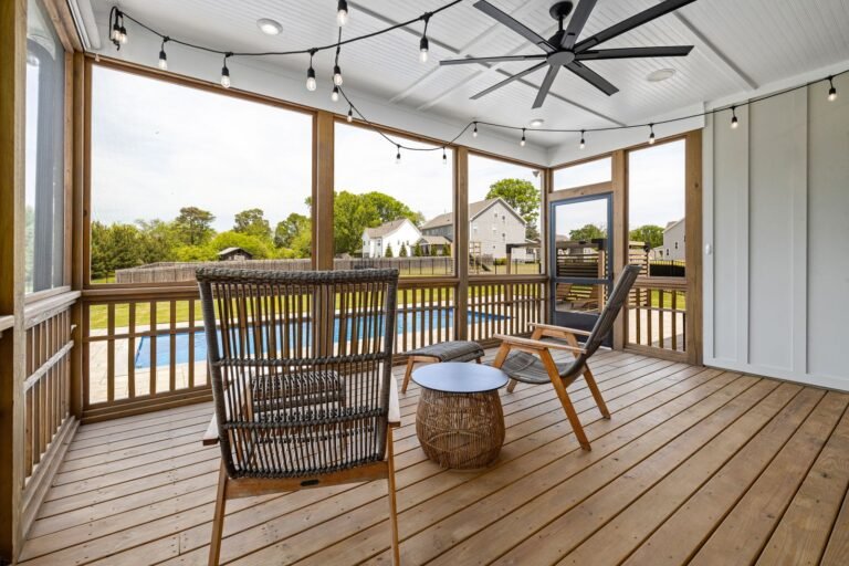Covered deck with outdoor seating and string lights